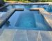 Why are gunite pools more durable?